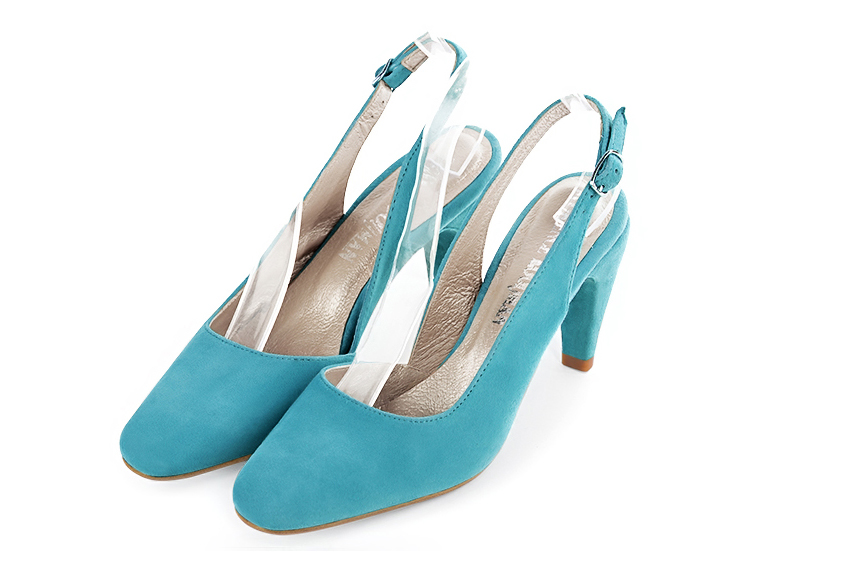 Turquoise blue slingback elegant shoes. Round toe. High slim heel.